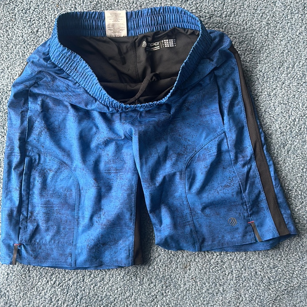 Mpg shorts with pockets and spandex underneath size s